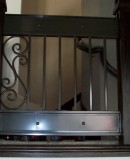 Modern Iron Railing With Scroll and Sheet Metal